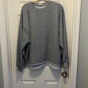 Cute gray sweatshirt! Very comfy! A little longer in the back.